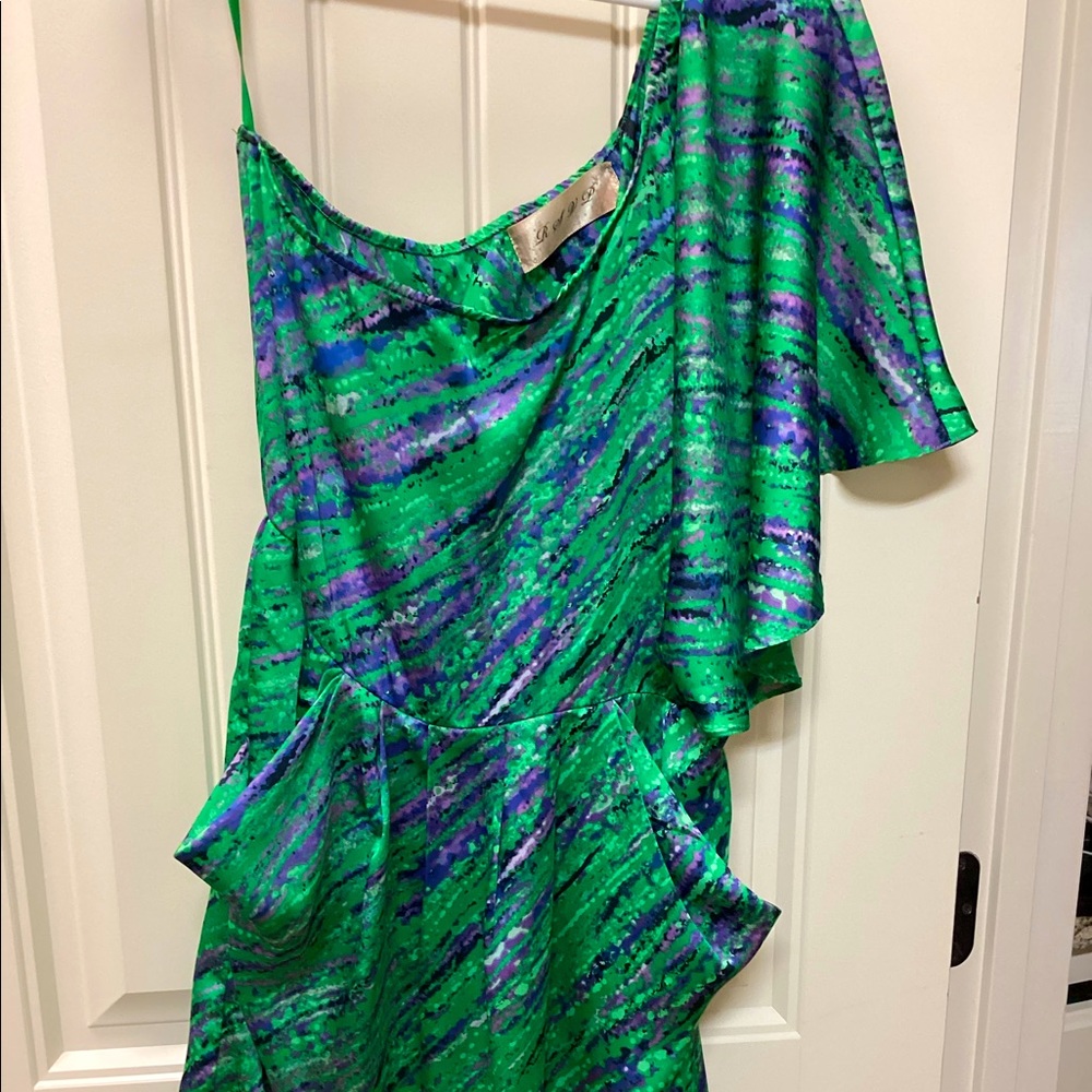 One shoulder mini dress with 2 pockets.